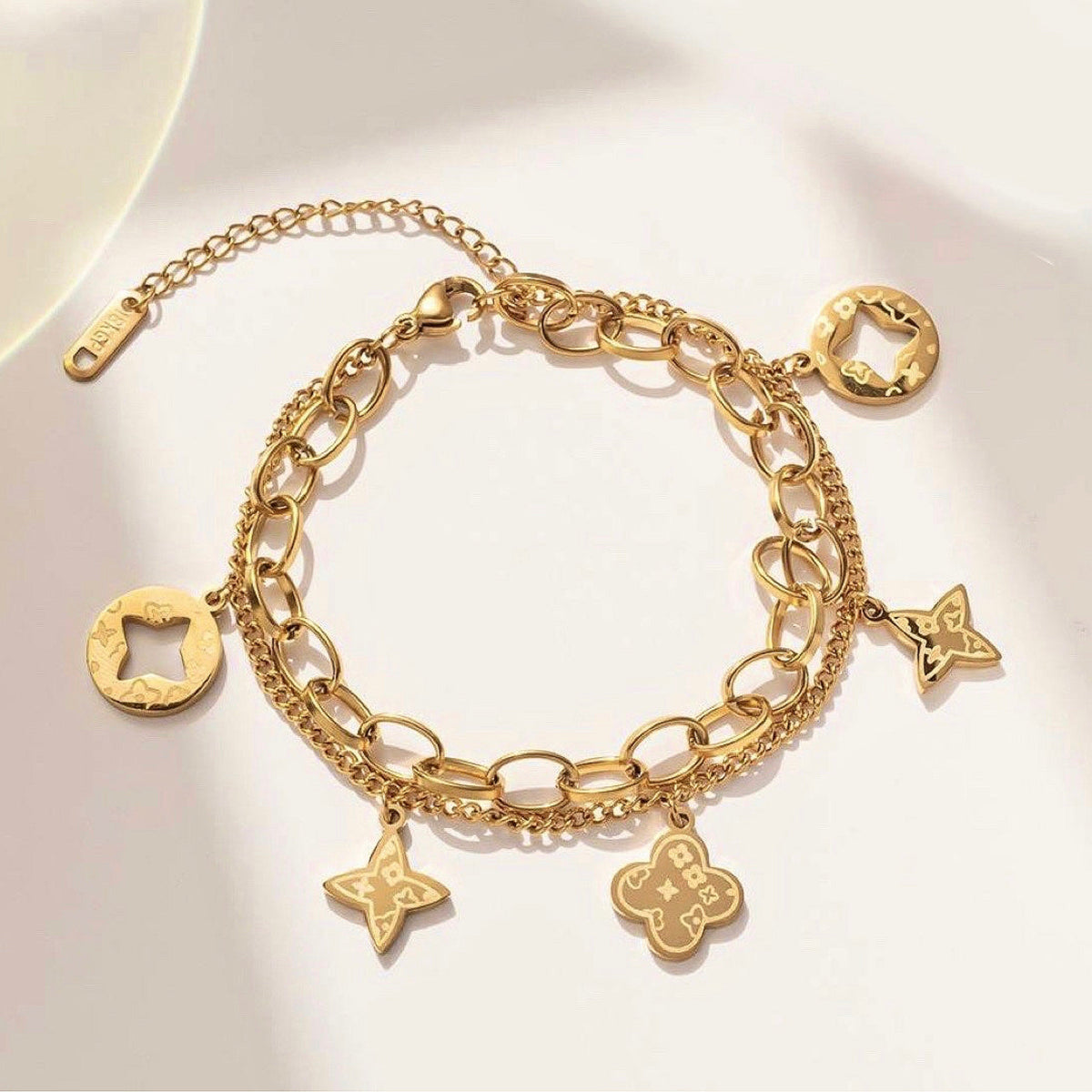 FOUR LEAF CLOVER CHARMS BRACELET - GOLD AND SILVER