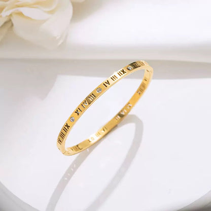 GOLDURA® ROMAN NUMERAL BANGLE