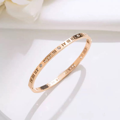 GOLDURA® ROMAN NUMERAL BANGLE
