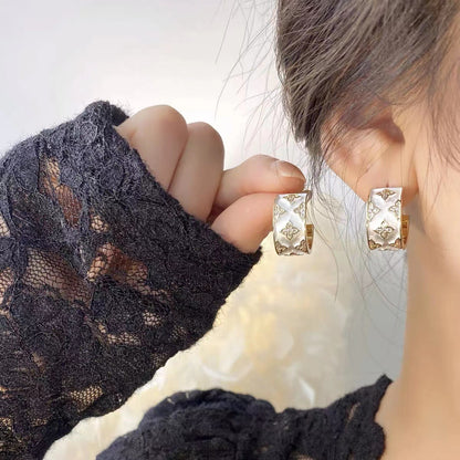 FOUR-LEAF CLOVER EARRINGS + RINGS