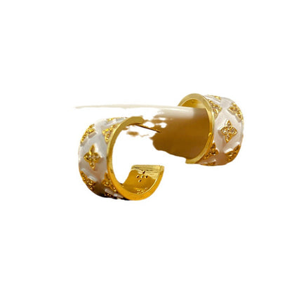 FOUR-LEAF CLOVER EARRINGS + RINGS