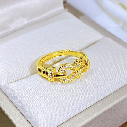 GOLDURA® PAVÉ HORSEBIT TWISTED RING