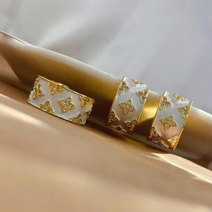 FOUR-LEAF CLOVER EARRINGS + RINGS