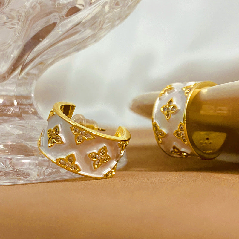 FOUR-LEAF CLOVER EARRINGS + RINGS