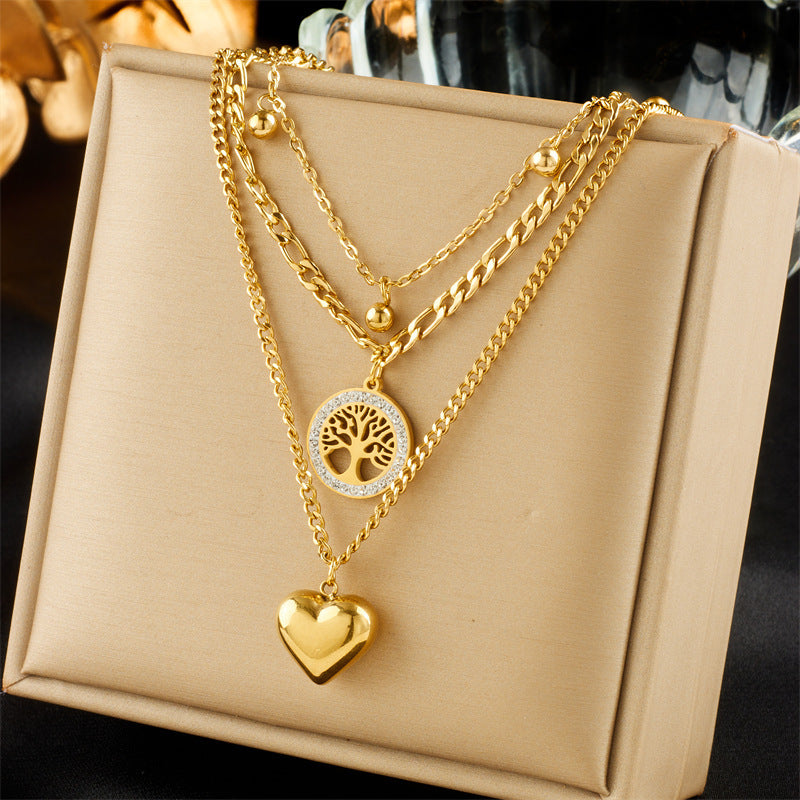 Layered Sunburst & Cross Pendant Necklace