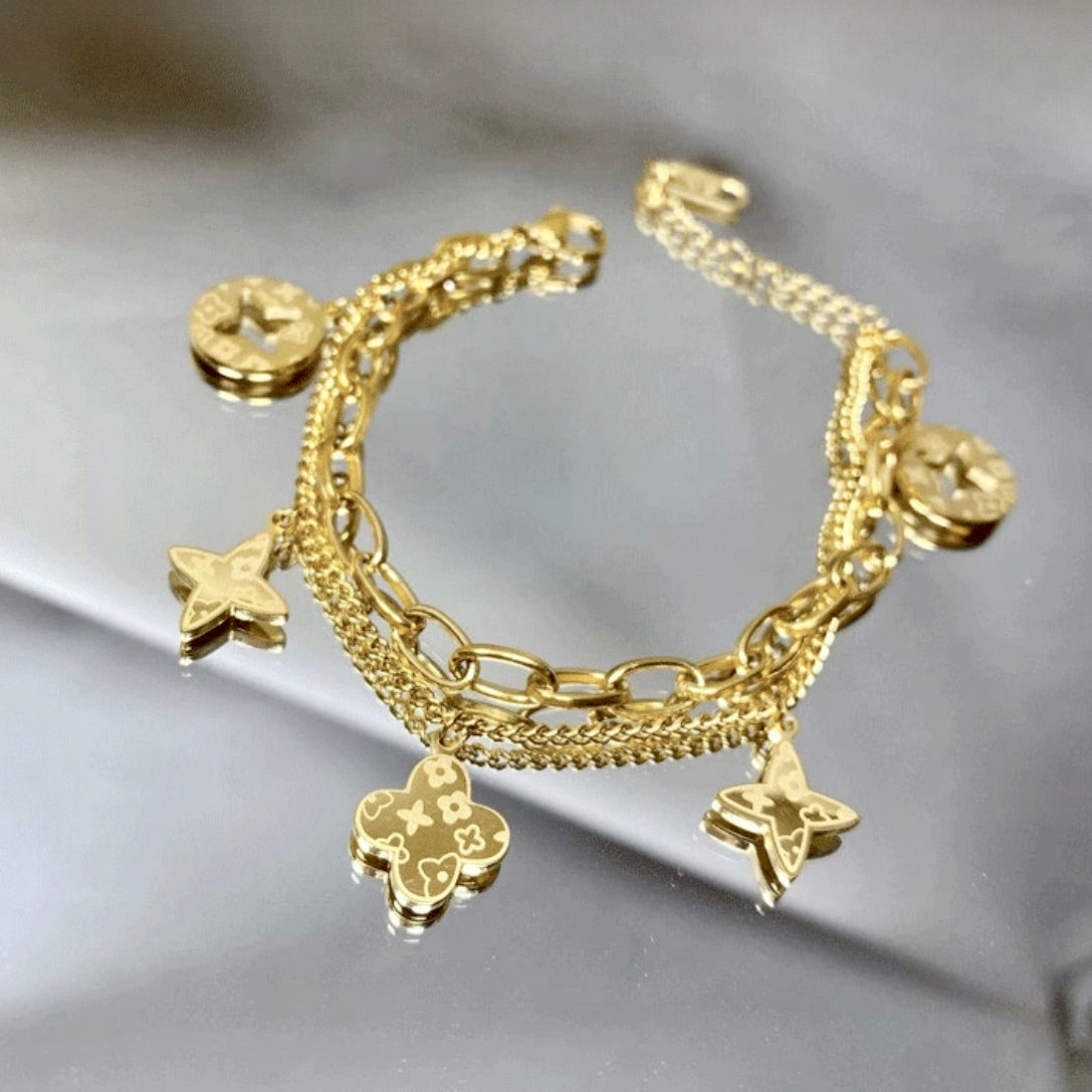 FOUR LEAF CLOVER CHARMS BRACELET - GOLD AND SILVER