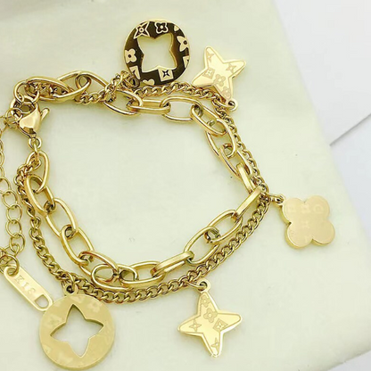 FOUR LEAF CLOVER CHARMS BRACELET - GOLD AND SILVER