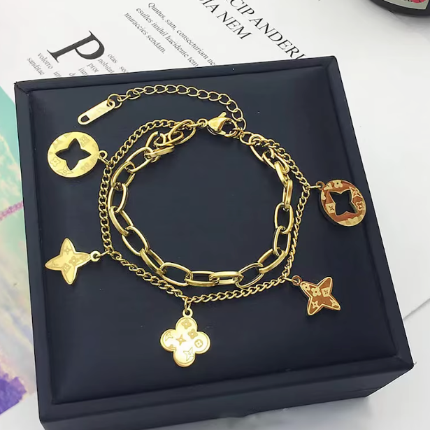 FOUR LEAF CLOVER CHARMS BRACELET - GOLD AND SILVER